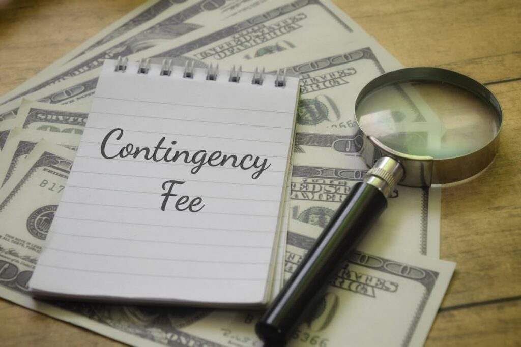 Contingency fee agreement concept with notebook labeled contingency fee, magnifying glass, and U.S. dollar bills representing California personal injury lawyer fees.
