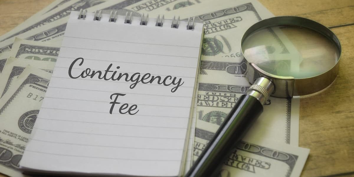 Contingency fee agreement concept with notebook labeled contingency fee, magnifying glass, and U.S. dollar bills representing California personal injury lawyer fees.